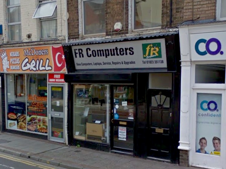 The old FR Computers shop on Bridge Street — a black shopfront with a green fr logo on the sign